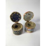 Two Halcyon Days enamelled musical boxes cylindrical form, including a Limited Edition box decorated