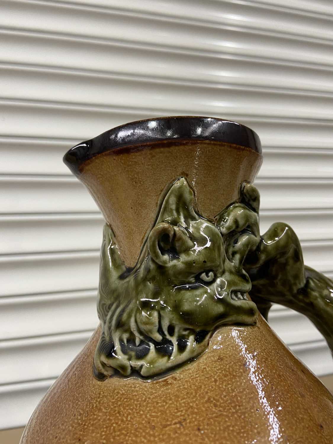 Large stoneware jug with applied, stylised three-dimensional green dragon snaked around the - Image 3 of 3