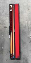 A cased two piece snooker cue