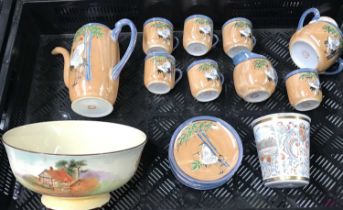 A Japanese orange lustre coffee set, 1930's, a Royal Doulton Series Ware bowl (parcel)