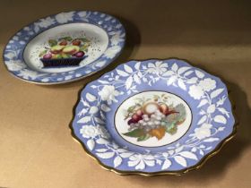 Two New Hall dessert plates, circa 1820, relief moulded rose border with central printed fruit