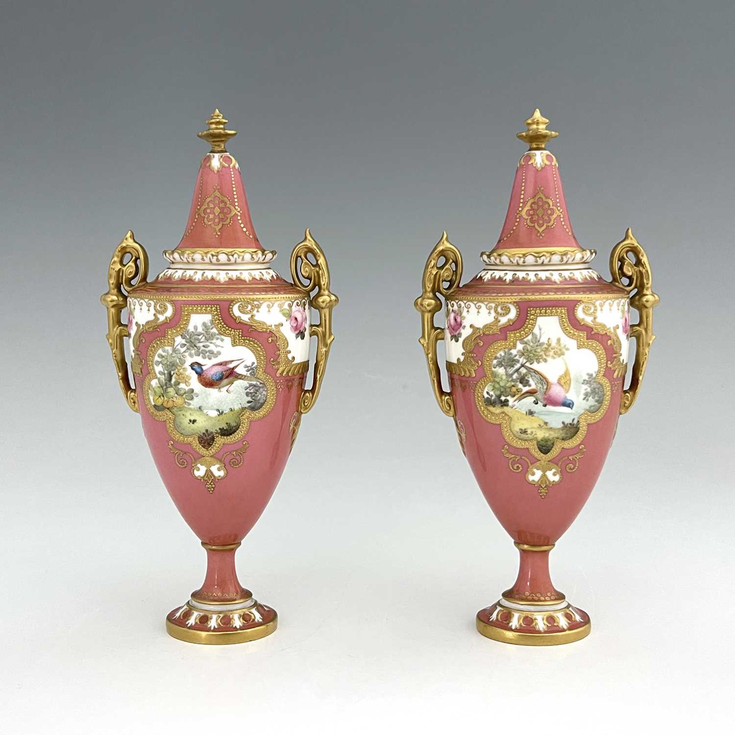 A pair of Royal Crown Derby exotic bird painted vases and covers, 1909, twin handled pedestal urn - Image 2 of 7