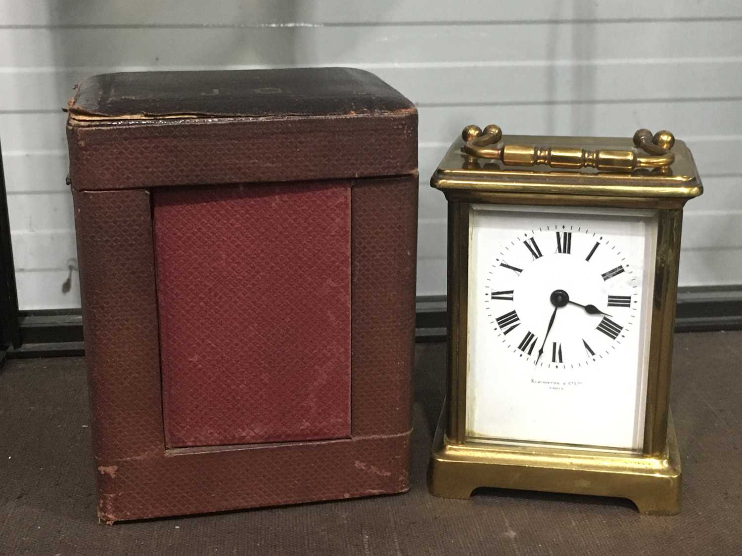 An Elkington & Co brass carriage clock, in a fitted carriage case, 11cm high