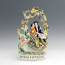 A Staffordshire figure of Robert Burns and Mary Campbell, circa 1850, modelled as lovers in Scottish