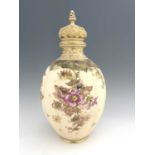 A large Royal Crown Derby blush ivory vase and cover, 1895, lobed ovoid form, painted with dog roses