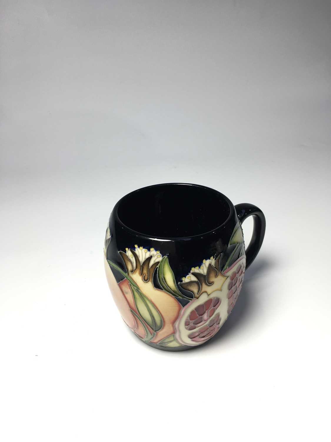 Helen Dale for Moorcroft, a Snow Angel Trial mug, circa 2016, ovoid form, impressed and painted - Image 2 of 3