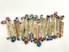 Forty-two antique bone lace bobbins, five with names, Ann, Mary, Ann, Henry and Jane (42)