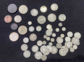 A collection of British silver coinage, including Charles II, George III, Victoria, Edward VII;