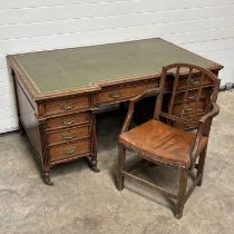 A late 19th Century oak breakfront twin pedestal partners desk, inset green leather top W: 153 cm D: