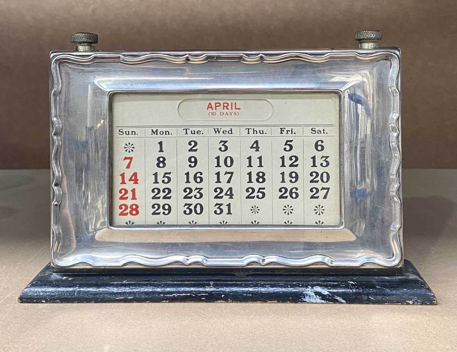 Mid-century silver framed perpetual calendar, hallmarked silver, W J Myatt & Co, Birmingham,1955