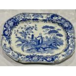 An early 19th century blue and white meat plate, The Font, octagonal form, decorated with a lady