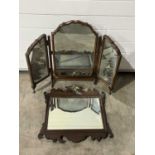 A triptych dressing table mirror 85 (fully opened) x 66 cm, together with a wall mirror featuring