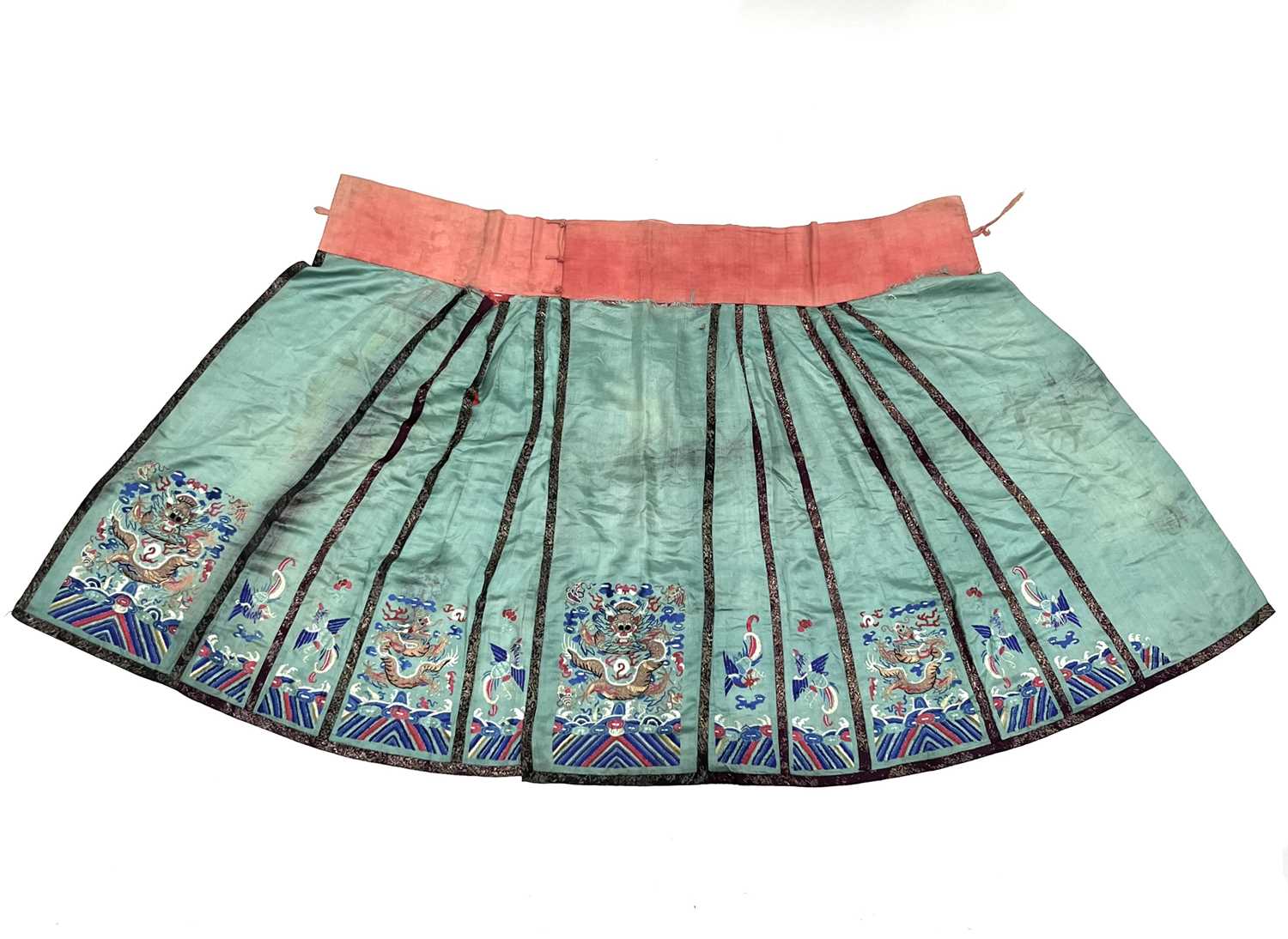 A Chinese silk embroidered skirt and overcoat, Qing Dynasty, 19th Century, the overcoat in red - Image 2 of 5