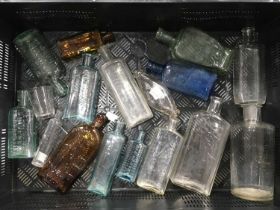 A collection of late Victorian Medicine and apothecary bottles to include a Warner's Safe Cure,