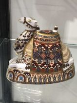 A large Royal Crown Derby camel paperweight, gold stopper