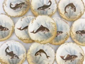 Limoges, France, a set of eleven freshwater fish-painted dessert plates (11)