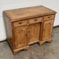 A dresser, fitted three drawers over three doors W: 100 cm D: 53 cm H: 78 cm