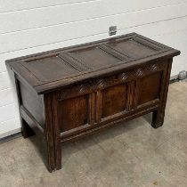 A dresser, with carved section to the front, on grooved block supports W: 104 cm D: 49 cm H: 61.5