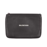 Balenciaga, a black leather clutch, featuring a top zip fastening and one interior side pocket,