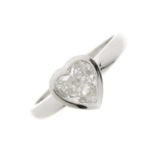 A platinum heart-shape diamond single-stone ring