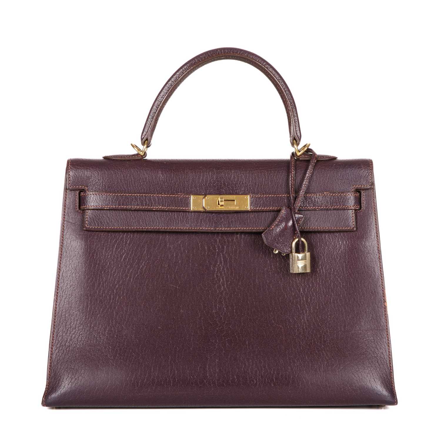 Hermes, a 2001 Kelly Sellier 35 handbag, crafted from Chevre Coromandel plum leather, with gold - Image 2 of 5