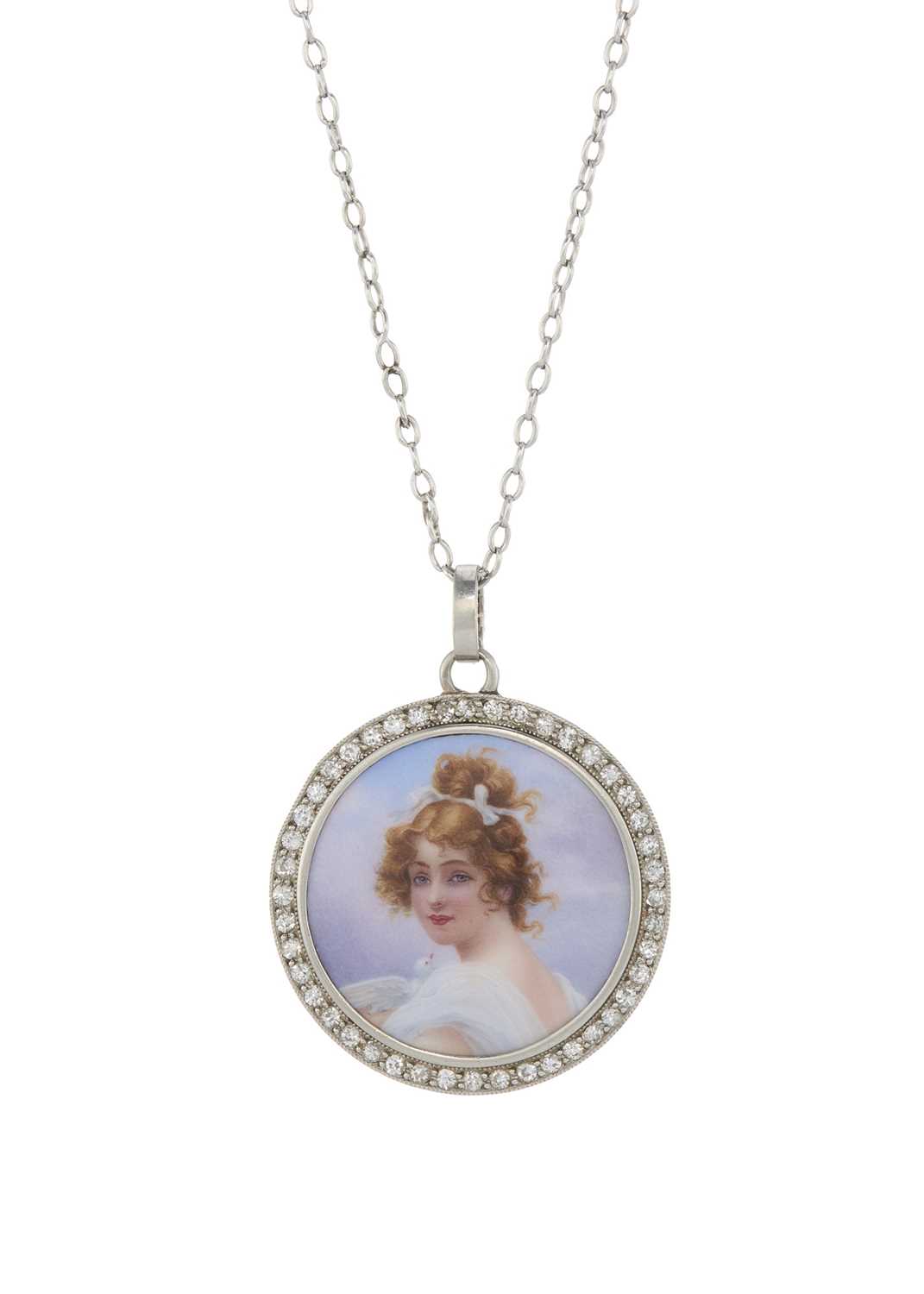 An early 20th century platinum diamond portrait pendant, with chain