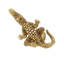 A gold alligator dress ring