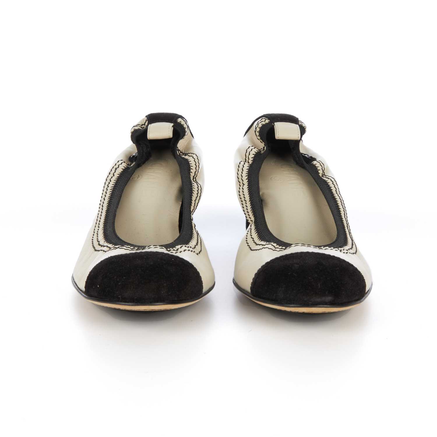 Chanel, an unworn pair of elasticated heeled pumps, designed with cream leather uppers with black - Image 2 of 4