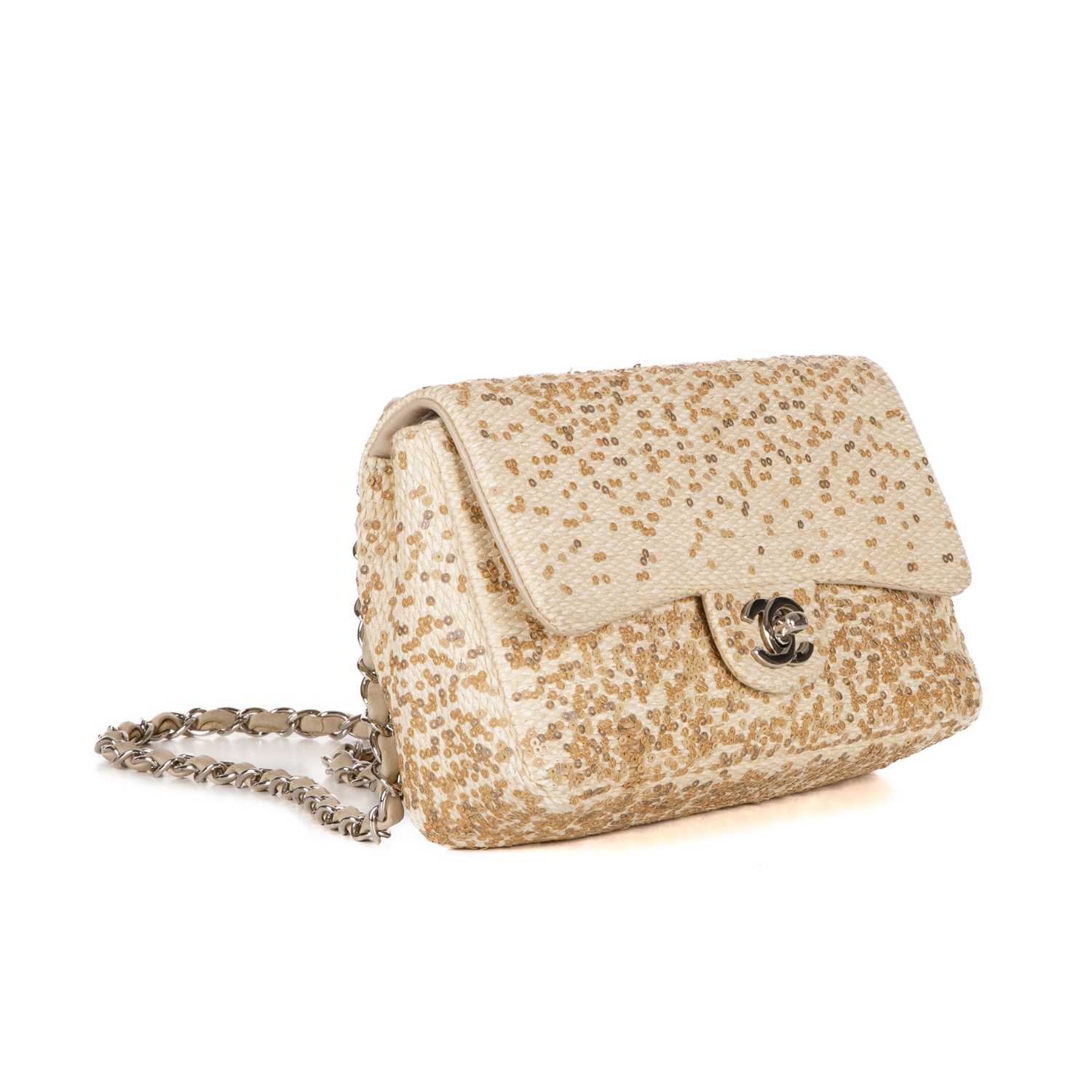 Chanel, a Raffia Sequin Single Flap handbag, designed with a woven cream raffia exterior accented - Image 3 of 4