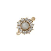 A late Victorian gold pearl and diamond cluster ring