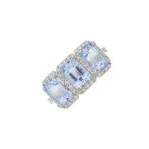 An 18ct gold aquamarine and diamond dress ring