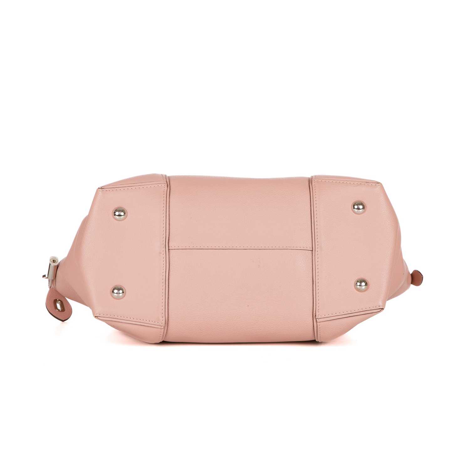 Louis Vuitton, a Lockit MM Parnacea handbag, crafted from magnolia pink leather, featuring - Image 4 of 4