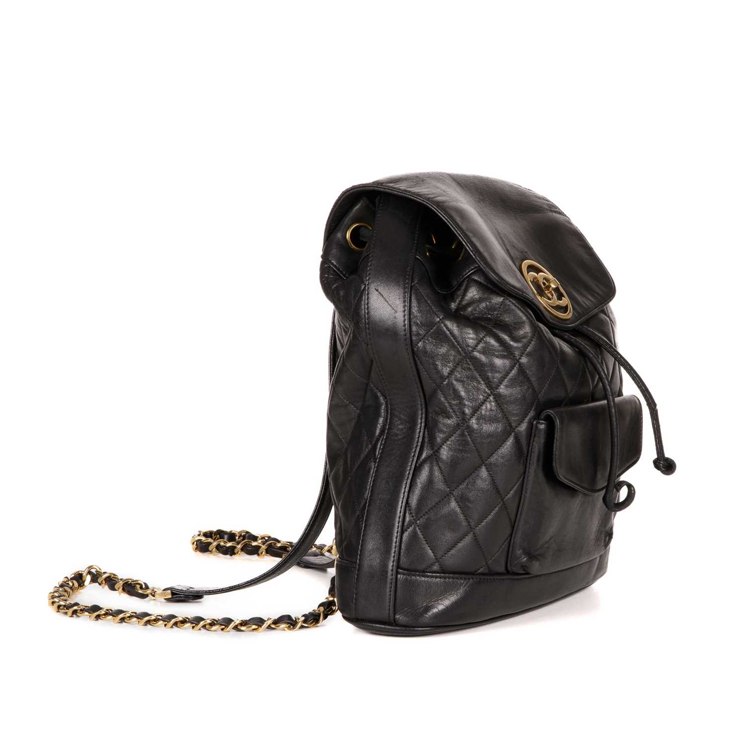 Chanel, a vintage black quilted leather backpack w/pouch, featuring gold-tone hardware, a front - Image 4 of 5