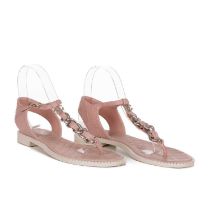 Chanel, a pair of chain-link thong sandals, crafted from pink quilted leather, with silver-tone