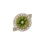 An 18ct gold peridot and diamond cluster ring