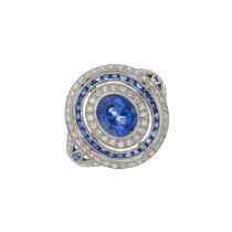 A platinum sapphire and diamond target dress ring