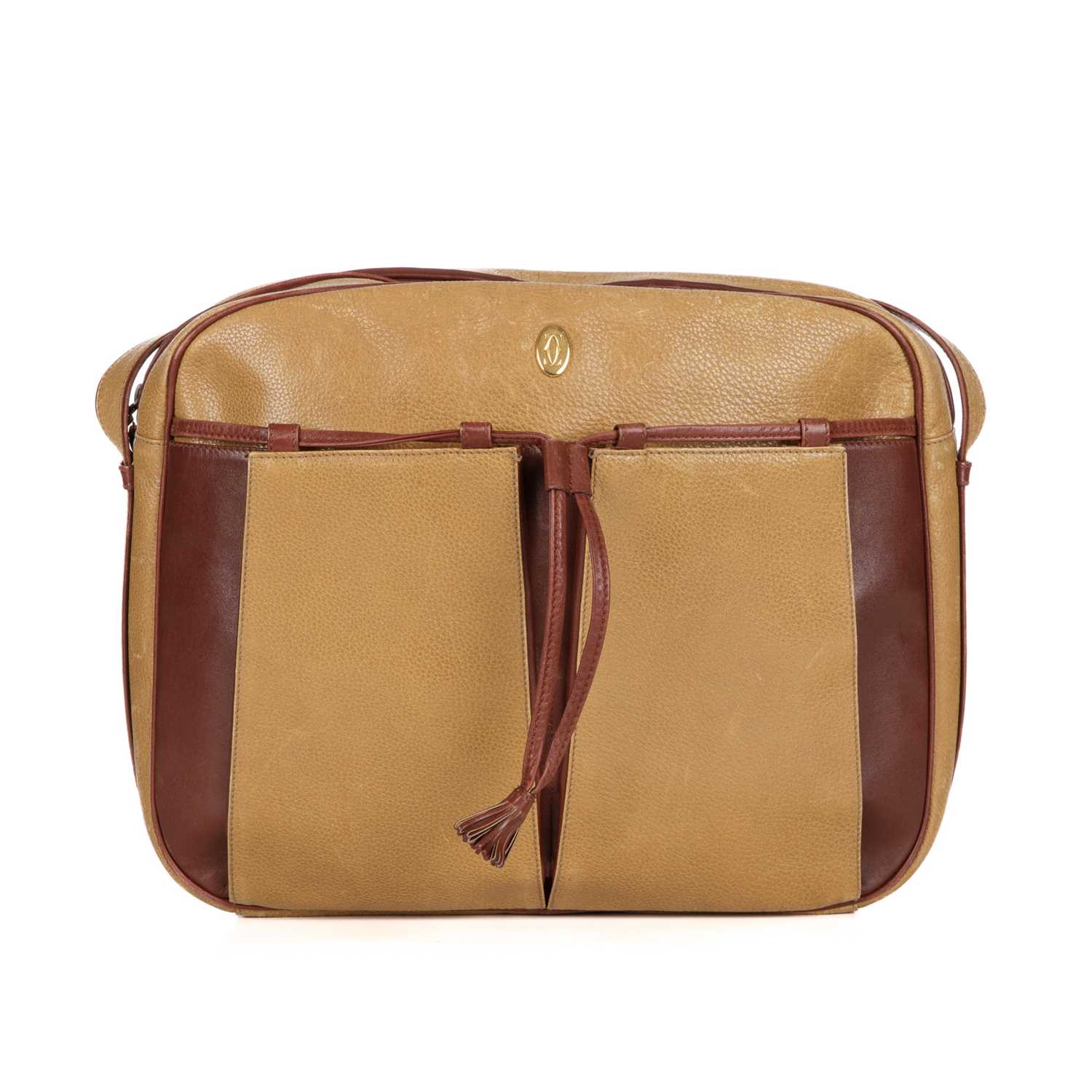 Cartier, a leather Must De Cartier crossbody bag, designed with a grained mustard yellow exterior,