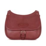 Longchamp, a leather crossbody bag, crafted from grained burgundy leather, featuring an adjustable