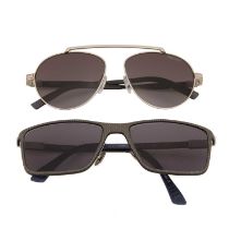 Two pairs of sunglasses, to include a pair of titanium Aston Martin Racing sunglasses, together with