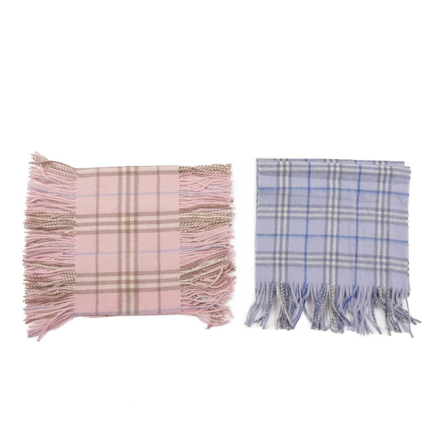 Burberry, two Nova Check lambswool scarves, to include a light blue scarf with fringe detailing at