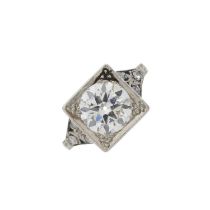 A Belle Epoque 18ct gold and platinum diamond single-stone ring