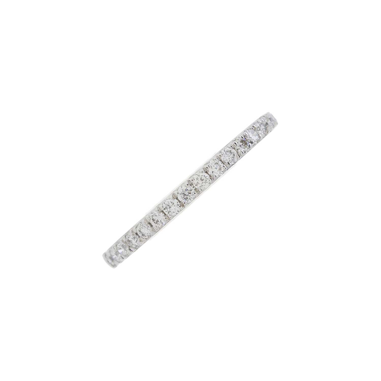 A platinum diamond half eternity ring