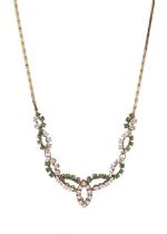 An 18ct gold emerald and diamond necklace