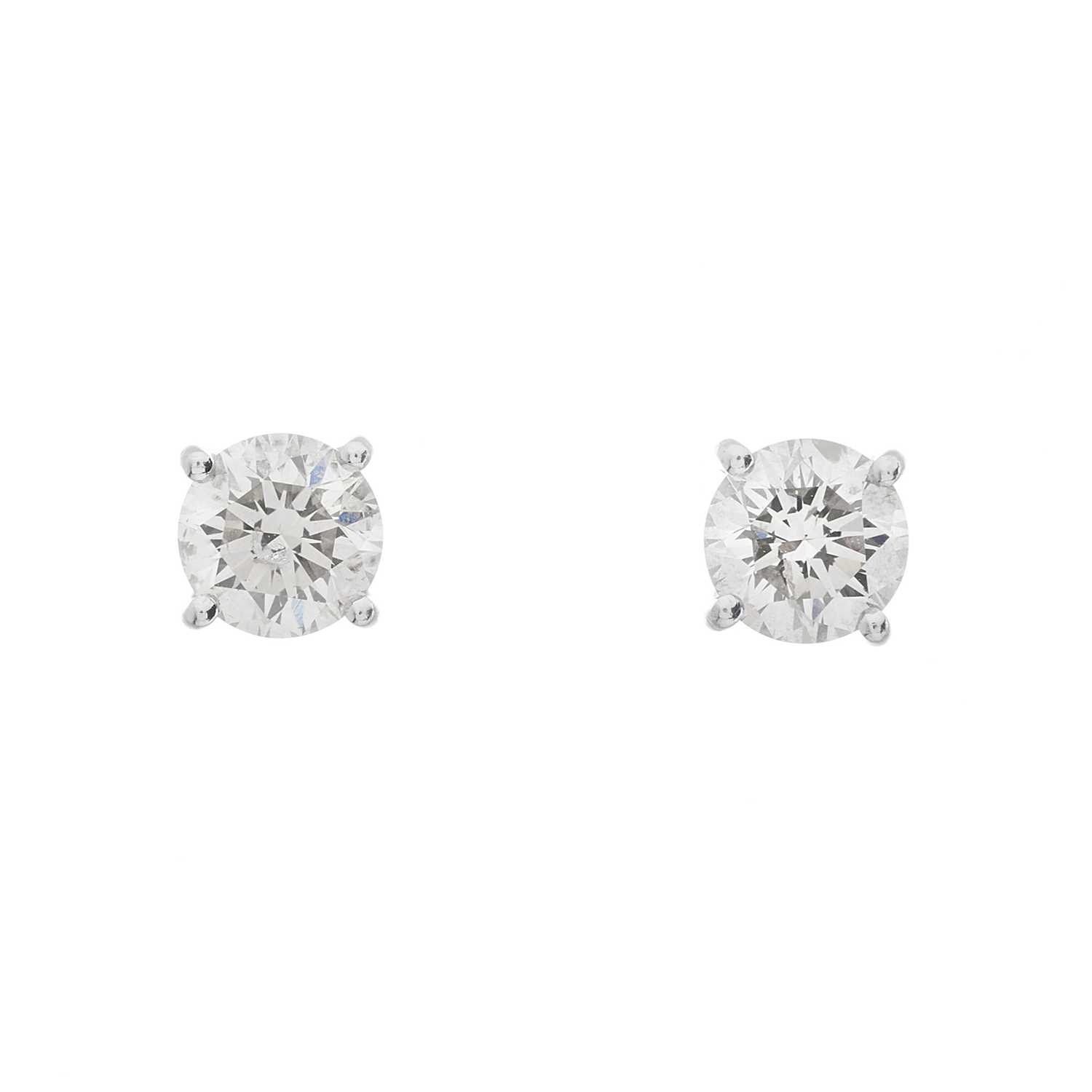 A pair of 18ct gold diamond stud earrings