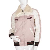 Coach, a ladies' bomber jacket, featuring a pink and cream polyester shell, with sequin star