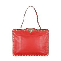 Valentino, a Rockstud handbag, designed with a red leather exterior, featuring a pyramid studded