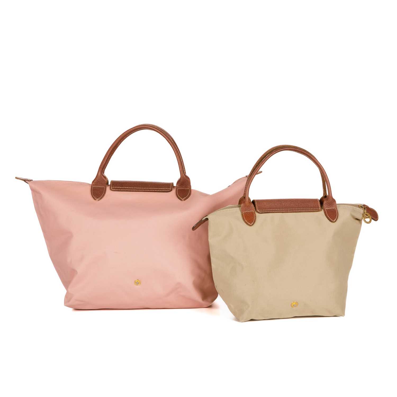 Longchamp, two Le Pliage handbags, to include a medium-sized pink example and a small beige example, - Image 2 of 4