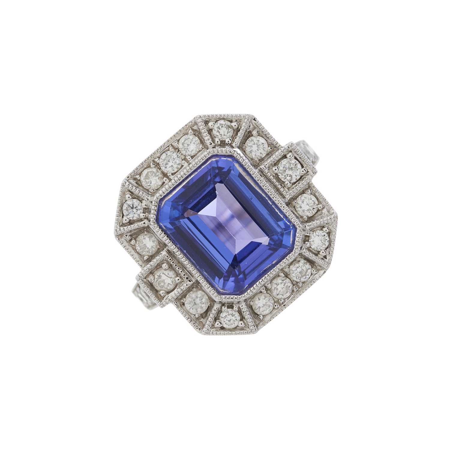 An 18ct gold tanzanite and diamond cluster dress ring