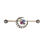 A late Victorian gold and silver, ruby, sapphire and diamond shamrock crescent brooch