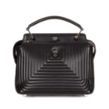 Fendi, a black Dotcom handbag, designed with a quilted black leather exterior, silver-tone hardware,